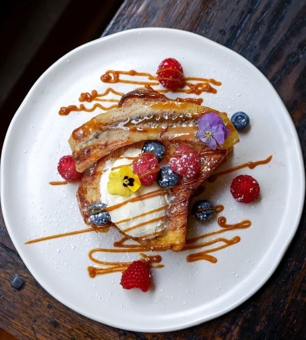 person photographing food